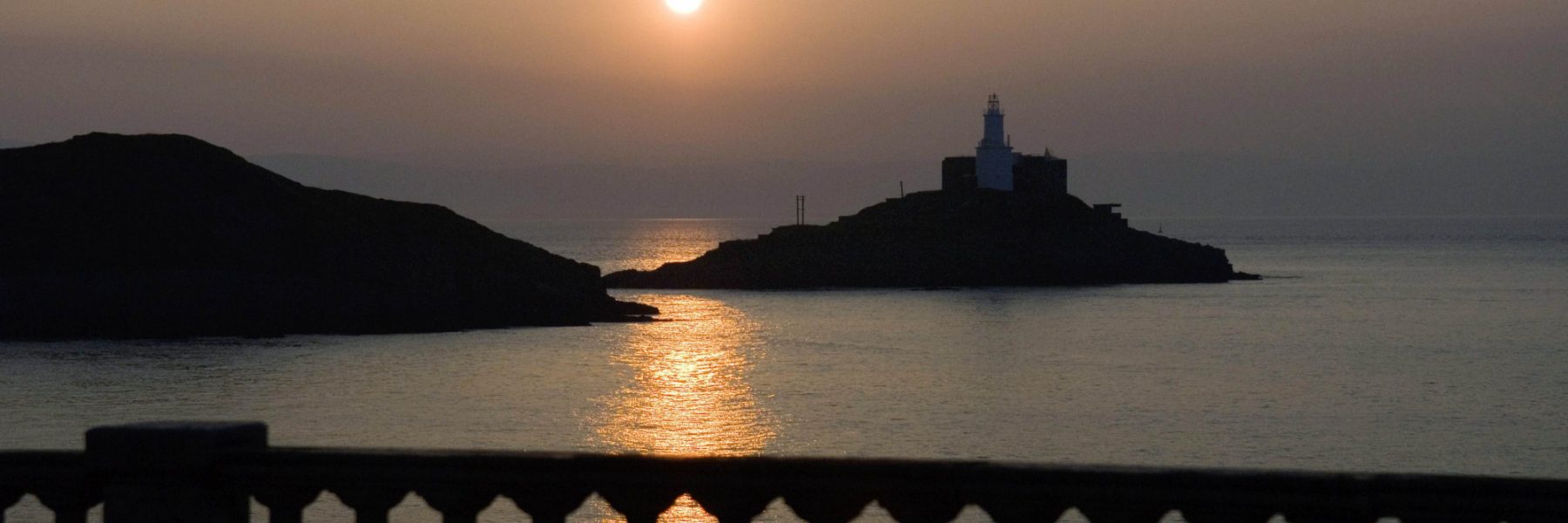 Aa page 18 inset Mumbles lighthouse sunrise